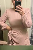 This  dress I got a size bigger which I'm thankful for. I'm a hippy girl. The bottom of the dress was a little tighter. So I went with a large instead of a medium. So glad I did! - Kayla J.