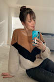 It's a slouchy, cozy fit, but not boxy. A great fall/winter addition! Love the colors. The earrings in the pic are also Lulus! - Mackenzie S.