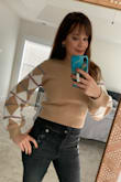 This sweater gives me a 70s vibe! The sleeves are fun. It's definitely cropped but if you're not into that look (like me), you can pair with high waisted jeans and be covered. Earrings in pic are also Lulus! - Mackenzie S.