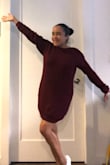 This was my first time shopping Lulus and I was just looking to buy something simple like joggers, just to see how they fit and go from there. Then, I saw this sweater dress and right away clicked to view. I was hesitant, because didn't want to be disappointed with the fit, but after giving it some thought and checking some of the reviews I decided to go for it. I'M SO GLAD I DID! I love the fit (which is loose), the back v-line make me feel sexy and flirty, the color is beautiful and festive, can wear it loose or belted for a more fitted look. I wore it for Thanksgiving with textured tights and boots (no pics) and wore it again to brunch with white tennis shoes. - Tarsis C.