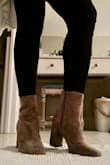Got my new booties last week and they look and feel fabulous. I'm a size 8B and they fit just right. They are well made and stylish.  Just in time for the holidays. - Gloria A.
