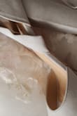 I ordered the grey for my platinum over pewter & blush wedding dress. The color looks fantastic against my veil in the sunlight (photo included). They are a very pretty warm shade of grey. My fiancé actually remarked on them being a perfect color for wedding shoes. They have a nice suede sheen to them that makes them go with any color they are next to. I usually fluctuate between a 7.5/7.5-wide for heels. I wish they had wide sizes for these because the foot length is perfect with the 7.5, but my toes have some overflow. I love these so much, I'm going to exchange them for 8's. Costumer service for the exchange was super easy and free. The ties are very comfortable against the malleolus bone and achilles. The ribbon is passed from the side of the foot through a loop at the back to keep it in place. The sole is nicely padded with a little extra padding at the ball of the foot. Only potential blister zone appears to be the arch over the toes if the size is tight. - Sarah L.