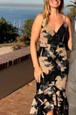 This is a high quality product. Love the shape and style. Got so many compliments at my sister's wedding. It cinches a bit tight at the waist then flares out at the hips. Super flattering. I could have worn no bra, but decided on going with a strapless bra in the end. The straps are adjustable to your bust size. - Brittany A.