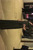 This is my favorite dress! I wore it to a wedding and I got so many compliments on it. It was perfect. It was chilly outside so it kept me warm but it also didn't make me hot when I was dancing. The slit is high but your leg doesn't really show unless you pull the slit apart. Very comfortable! - Monica M.