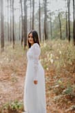 This dress is absolutely beautiful! The detailing on it is stunning and the open back adds the perfect touch. It fit a little big on the sleeves and the back so I had it altered just a pinch so it could fit more snug. I loved that the fabric isn't cheap or transparent. It flowed so nicely and was very comfortable to wear. 10/10! - Liliana R.