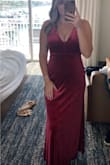 I ordered a M and L, I tend to be a L but my measurements were right in between so I wanted to be safe. The material is stretchy, in a good way, so I was able to fit perfectly in the M!  It would have been very comfortable if I didn't wear two pairs of spanx underneath. I wore 2" heels, any taller and the dress would have been too short. Overall I thought it was really flattering on me! - Cassidy S.