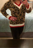This sweater is very stylish! I ordered Small/ Medium and it fits perfect. It's a great length, soft material and I have never seen anyone else wearing one like it - Shanna L.
