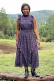 Ordered a small. Love the dress, the color, cut, and fit. This dress gives me retro vibes. Love the cut of the neck and all the frail details. The smocked waist allows for extra room. Really well-made dress. Adding this one to my favorites. Yes, I would recommend it. - Auxilia C.