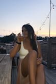 This tank is so hot, I love it! Perfect amount of cleavage and stays put! Unfortunately, I think I wore it so much, the wires to create the V popped out... :( - Taylor C.