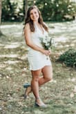 I wore this dress for my backyard COVID wedding and loved it! It was so flattering and comfortable. The V-neck probably could have been taped down since I didn't quite fill it out, but still would recommend. - Sarah B.