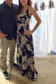 Just as described.. I got tangled putting it on but once tightened and tied, all good. The chest area was a big loose so I just wore a bandeau under. It was pretty long for me - I wore 4" heels and still had to hold on to my husband when we walked around LOL! - Nicole T.