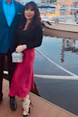 This skirt is a pretty color red, and as a nice shape to it. It works well with the Lulus black, long sleeved sweater with an open back, and Lulus fun, bling sandals. - Melanie D.