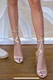 Purchased these for my elopement and they were super flattering in photos! I received a lot of comments from friends!! I am a 9.5 in heels but I needed to size up since they don't carry half sizes (refer to pic) but I don't think anyone noticed. Only downside for me was that my calves may have been on the smaller size for the tie situation so I had to really pull it tight to keep it fitted on my leg. Still super cute though!!! - Emma H.