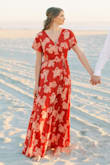 I got this dress for my engagement photos and it worked out really well! The length was good for me being bare footed since I am on the taller side. The only concern I had was the top being low cut. I wished it had a button up top to help keep it closed but it does not. I just used double-sided tape and was very happy with it! - Katrina M.