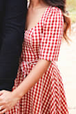 Really love the length and color but I can barely close the button on the waist area. All in all still a good dress. - Muriel O.