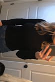 Form fitting, but fabric is soft and has the perfect stretch to it! I would buy this shirt in every color if they had more options! - Alyssa D.