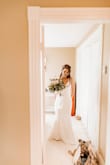 I loved this dress! I went wedding dress shopping and liked a $1200 dress but I wasn't entirely sold on it so I ordered this one to compare. The fit was great (I did take it in and hemmed a bit), the material was nice & thick, and it really did fit like a glove.
I would definitely recommend! - Maggie M.
