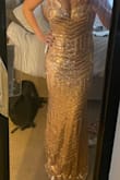 This dress was so pretty. I left like the length was appropriate for me and I am tall. Fit perfectly. - Kelsey M.