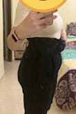 I was excited to see these pants were back in stock, since I need to wear navy pants for work. Over the summer I purchased the "Set Your Goals Navy Blue Paper Bag Waist Pants" and they are fine, not the best quality but at least they stretch and are flattering. When I received these, the quality of the fabric was better, as expected, but the fit is off. First, although the fabric is better, I can tell it won't be breathable. I live in a hot climate so that's a must. The crotch was also about an inch below where it should be (when the waist was at my natural waist) and I wonder if it could cause chaffing. So I pulled the waist up but then it's ridiculously high! (see first photo). With a bit of a pooch, that does not look flattering on me. I also noticed that the pleats just make my belly look even bigger the way they puff out. Oh well. I'll be returning this one. - Kara G.