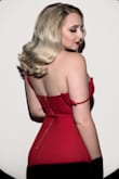 This sexy, elegant red dress makes you feel powerful and womanly. I'd highly recommend it! It emphasizes curves you didn't even realize you had. I bought it for a Marilyn Monroe themed photoshoot and this dress did it all sorts of justice. The dress fits snug, but the material is enough stretch for you to breathe. - Raven J.