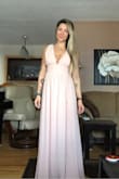 Received this dress the other day and it is beautiful! The length is a little long but will get it hemmed along with some extra fabric taken in in the breast area as it runs a little large there but otherwise fits true to size. I ordered it from Canada and did have to pay approx $30 in import fees. Looking forward to wearing it to the wedding! - Nicole K.
