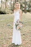 I was so happy to find this dress. I was unsure when I ordered it because the price suggests cheap material that may impact the look but the fabric is very nice, a little thicker (perfect for a fall wedding) and shapes around the body beautifully without squeezing!
I had it shortened a little bit and wore it to my wedding and everyone loved it! - Clara W.