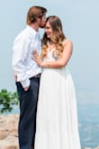 I wore this to elope in! It's stunning and I can see myself wearing this many more times! I usually wear a medium and it fit great, little loose but wouldn't change the size. This dress was perfect! - Caroline