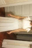 The dress pictured is the first one I ordered and it fit perfectly, right out the package. I had to get it hemmed of course. When it arrived it had a few snags in the skirt and a small black smudge stain on the top (I am assuming from brides ordering dresses to try and sending them back), none of the flaws were extremely noticeable. But customer service got back to be extremely quickly and was willing to ship me a new dress. However, I was able to get the same seamstress who hemmed the dress to also fix the snags and stain, and Lulus refunded me what she charged me for the fixes. I love how affordable they are and how easy they were to correspond with. The best customer service from any online product. - Nora C.