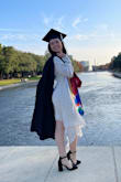 I had lots of compliments on this dress for a graduation! The flowing sash on the side gives a beautiful asymmetrical silhouette to the dress which I thought was fun. Sleeves are a little long for me, and top part was a little big for my chest, but it still worked. - Marilyn P.