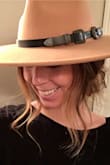 I love this hat! It is a little tight but not tight enough to return it! The belt on the hat is extremely cute as well! The hat is sturdy, so it should last a while. Can't wait to mix and match it with everything! - Haley H.