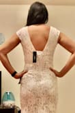 I absolutely am in love with my dress from Lulus! It fits perfectly in my waist, chest and back. The length is great and can be worn with or without heels and it still covers my feet. I like that it is easy to walk in and doesn't feel like I'm going to constantly trip every second. I think this is beautiful for the price and I am so excited to wear it for my wedding! - Amanda R.