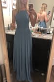 I loved this one! Flattered my small chest and fit perfectly. Great for not having any boobs lol The back is so pretty and it shows off arms and shoulders nicely. Colors brought of my blue eyes like no other blue and flattered my fair skin. Highly recommend! Just needs a hem - Laura T.