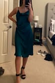 Such a gorgeous color but goes down to my mid to lower shin... getting it hemmed to right below the knee. Easy fix but still. Slit is off and sits in the middle weirdly but not awful. Adding picture after getting it fixed- looks blue-ish in the pic but it's truly emerald green - Katie C.