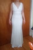 This dress looked really good on. The material was so soft and felt really comfortable. I bought several dresses and had to eliminate some. I decided against this one because we had a really tough time with the zipper. It was very difficult to zip up past a thick section on the seam. - Kimberly H.