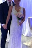 Wore this dress to my intimate wedding ceremony. Everyone LOVED the dress! My only thing is that it was slightly long (even though I wore platform shoes). Also make sure to have a good nude underwear since it can be slightly see through. - Daniela N.
