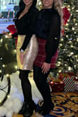I ordered this for a holiday outing with some girls from work. The skirt quality isn't up to par with some of the other items I've ordered from Lulus. It's made of a thinner material and showed my bodysuit lines and other unflattering lines through the skirt. I'm usually an XS but had to return this for a S. Despite this, it still looked cute on! - Tracey E.