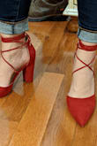 I love these! The color is fantastic shade of red that matches most of my lipsticks and looks like a pop of colour that can still be worn professionally. The straps are sexy and add to the look. Heel is easy to walk in. Very satisfied. - Mariia A.