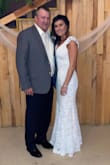 This dress fit absolutely perfect! The only thing I had to do was alter the length. I wore 3" heels and I did not want it dragging the ground. We had a very small private wedding with each of our children and their families. - Heather H.