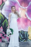 My husband and I eloped in the Florida Keys and this was the PERFECT dress!!! Fit like a glove with no alterations and photographed beautifully! - Jessica P.