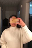 This sweater was really baggy. I'm more on the petite side, so the sweater looked like it was swallowing me. Also, the neck looked weird on my short neck. So if you have a short neck like me, keep in mind that this sweater might not work for you. I will say that the sweater is super soft! But overall it's not for me :( - Nancy A.