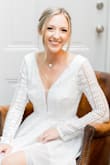 Loved this dress for the last minute wedding changes we had to make this year. We eloped at the coast and these long sleeve lace details made all my boho dreams come true! Wore a nude slip type thing under because the bottom portion is on the sheer side, but was able to make it work for sure!! Loved this look so so much, thank you Lulus! - Lainie A.