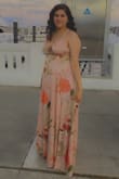 Loved the dress, really long even with heels but it's still really nice, dress is a bit heavy but overall satisfied with my purchase. One thing I will complain about is as I took the tags off in the process the stitching came apart. - Selena L.