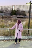 Nice coat! It would have been nice if it had a A-line cut to avoid baggy look. I also don't like the hooks .. very difficult to put on. Other than that I like the length and it's very warm. - Fatima A.