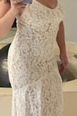 No alterations needed this dress is stunning. It's long with a mini train but nothing a pair of heels won't fix. - Danielle D.
