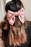 Super cute bow. Easy to put on clip. Wore it and revived compliments. - Megan O.
