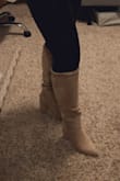 Love these!!! I have a wider calf and I usually have to order Wide Calf boots but these actually fit me!!! They're not loose like some of the pictures of slimmer women but they are so cute and comfy! - Nicole W.