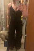 The material is very stretchy and very soft which helps with a muscular figure. This is what I plan on wearing to my rehearsal dinner in Key West! Wanted to wear something different than a maxi dress and glad I went with the jumpsuit. - Stephanie S.