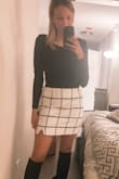 This skirt is perfect for a heated outdoor dining date night as the material is thick and can wear with tights for an extra layer. Could easily transition into a spring or fall look with a pair of open toe heels and a bodysuit. I am between a small and medium. I opted for the medium and it is a little bit large, but if I wear more ok my hips than my waist it is just fine! Love this! - Amanda J.