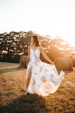 Fits perfectly! I never needed to adjust it. Wasn't heavy which I was afraid at first that it would be but once I put it on I was surprised. I wore it for our family photos and needed a photo of myself workin it. Definitely a happy buy! - Kendra Y.