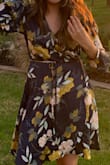 The only thing that I did not like about this dress was that it was a wrap dress. The cleavage area was too big so I had to Bobby pin it. It did fit a little bit big so that's something I had to work with. Overall I loved the quality of the dress and the pattern. - Joslyn A.